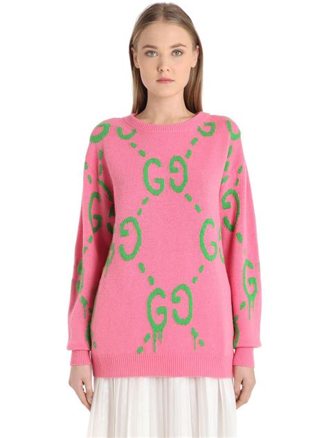 pink and green Gucci sweater